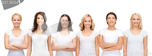 Image of group of smiling women in blank white t-shirts