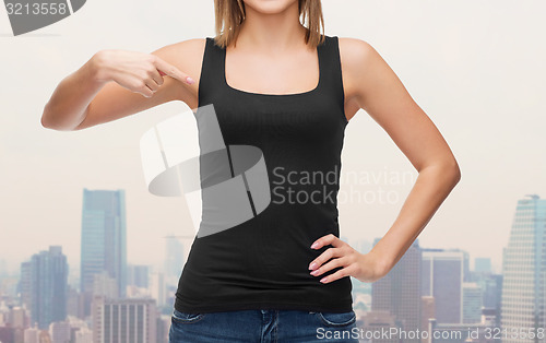 Image of close up of woman in blank black tank top