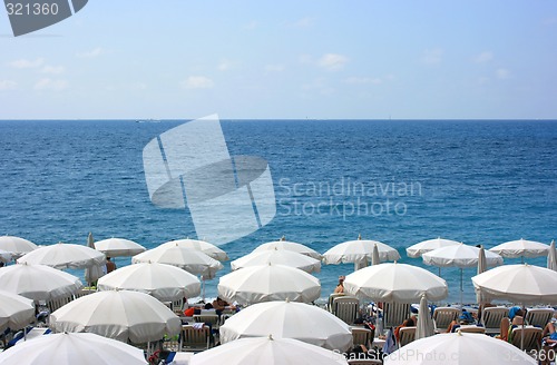 Image of Beach with white umbrellas