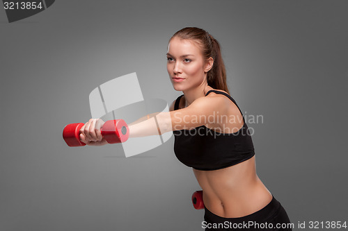 Image of Sporty woman doing aerobic exercise 