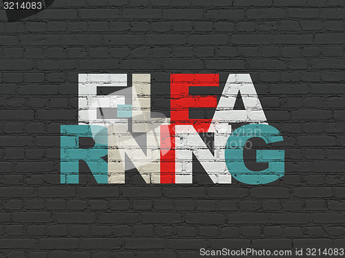 Image of Education concept: E-learning on wall background