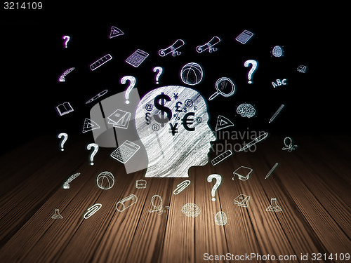 Image of Education concept: Head With Finance Symbol in grunge dark room