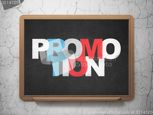 Image of Marketing concept: Promotion on School Board background
