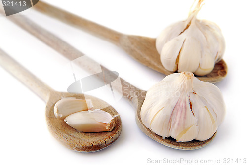 Image of Garlics and spoons