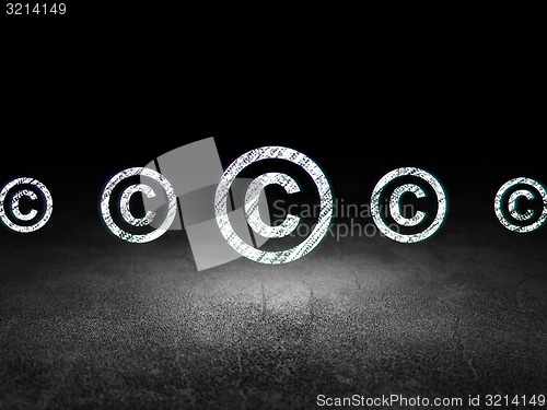 Image of Law concept: copyright icon in grunge dark room