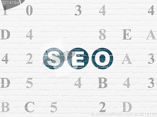 Image of Web development concept: SEO on wall background