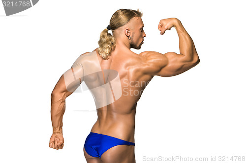 Image of Attractive male body builder on white background