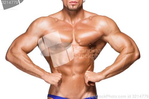 Image of Attractive male body builder on white background