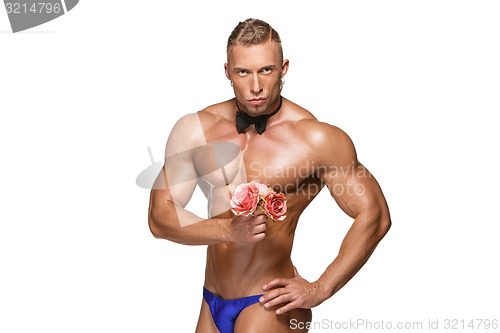 Image of the very muscular handsome sexy guy on white background, naked  torso