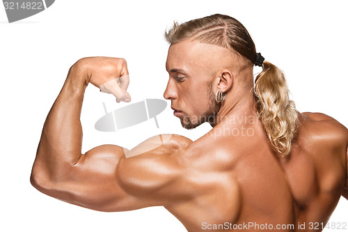 Image of Attractive male body builder on white background