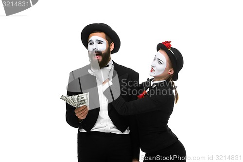 Image of memes as businesswoman and businessman counting money