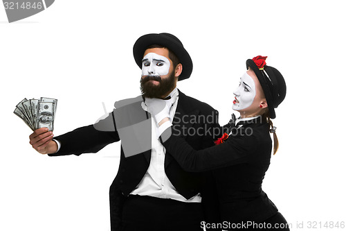 Image of memes as businesswoman and businessman counting money