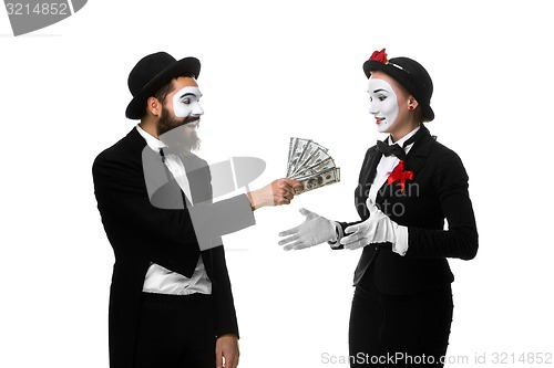 Image of memes as businesswoman and businessman counting money