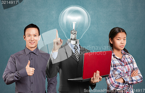Image of Asian team and Lamp Head Man And Business Team 