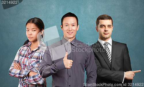 Image of Asian team and male in suit