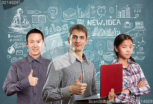 Image of Asian team and man with laptop in his hands and woman
