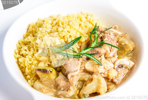 Image of Meat stewed of rabbit closeup on white plate