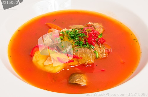 Image of tomato soup with meat