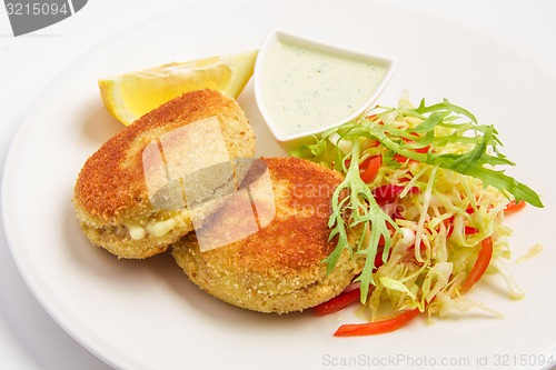Image of fishcakes with vegetables