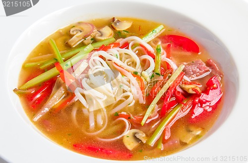 Image of Pho bo, Vietnamese soup with rice noodles, beef and mushrooms