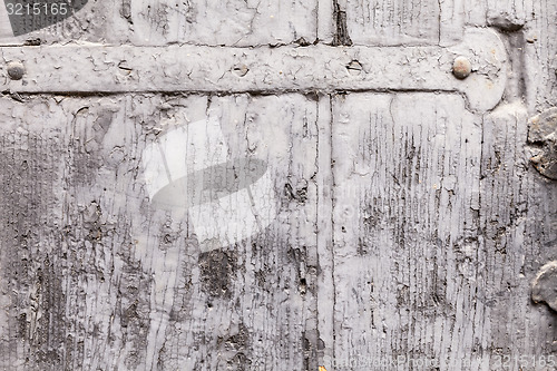 Image of Brittle Texture Of Paint Coat On A Wooden Shutter