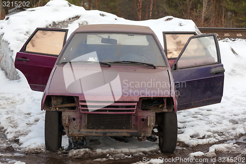 Image of Passenger car with before being sent to landfill