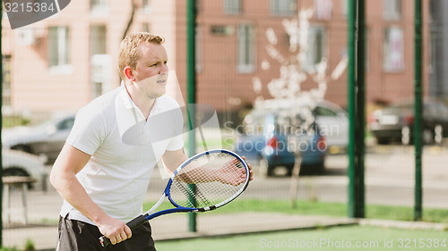 Image of man play tennis outdoor