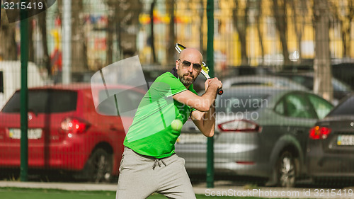 Image of man play tennis outdoor