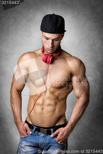 Image of Athlete with cap and headphones