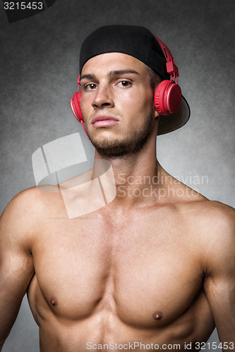 Image of Athlete with cap and headphones