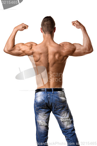 Image of Athlete in denim trousers