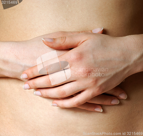 Image of Hands on a belly