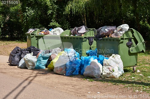 Image of Garbage Containers Full, Overflowing