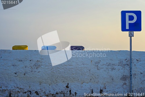 Image of Containers covers and disabled parking sign