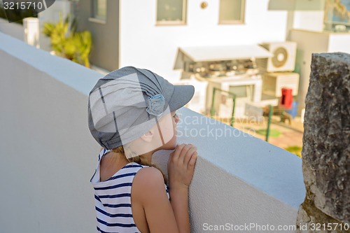 Image of Adorable little girl in the city