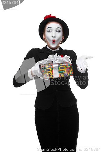 Image of Mime as playful, joyful and excited woman with gift 