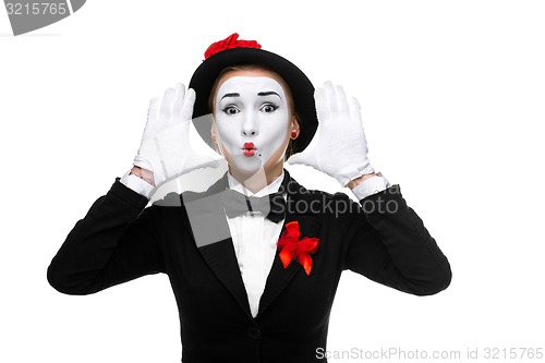 Image of Portrait of the surprised mime with their hands up