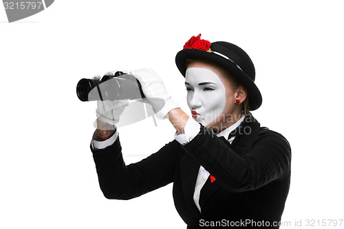 Image of Portrait of the searching mime with binoculars