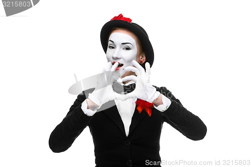 Image of Portrait of the mime  with hands folded in  shape as a heart