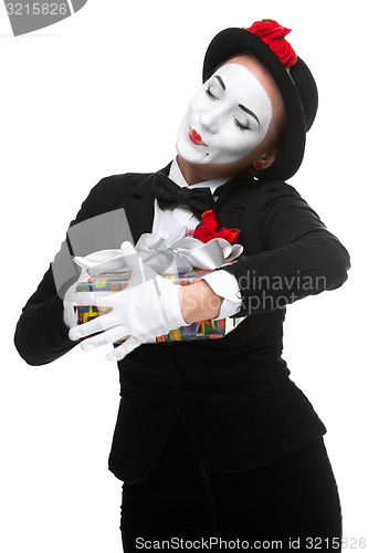 Image of Mime as playful, joyful and excited woman with gift 