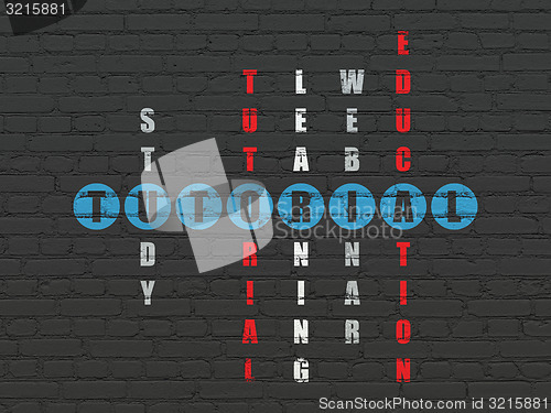 Image of Education concept: word Tutorial in solving Crossword Puzzle