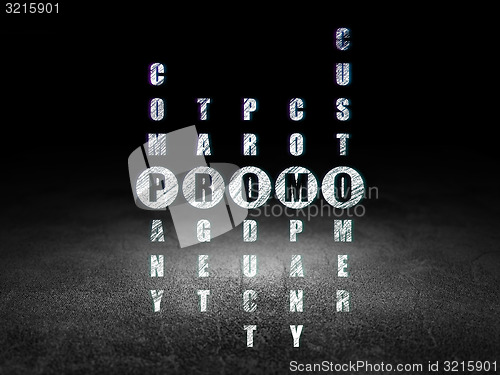 Image of Marketing concept: word Promo in solving Crossword Puzzle