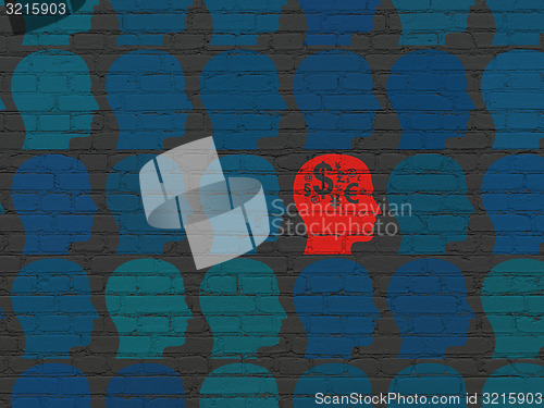 Image of Finance concept: head with finance symbol icon on wall background