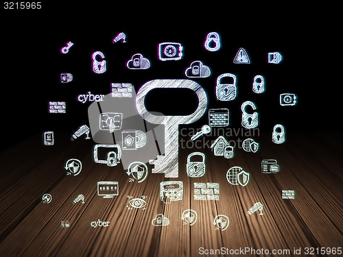 Image of Security concept: Key in grunge dark room