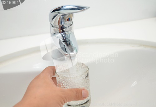 Image of Filling glass of water  