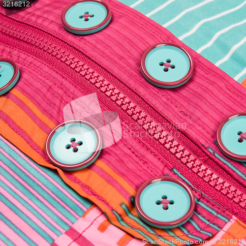 Image of Close up zipper and button