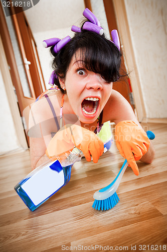 Image of housewife washes a floor