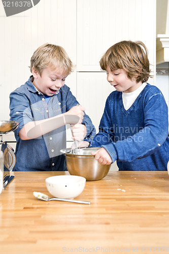 Image of Kids having fun during a baking workshop