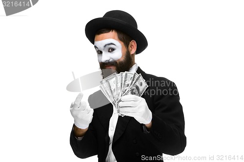 Image of mime as businessman luring money