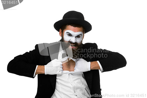 Image of mime as a businessman tearing his shirt off 